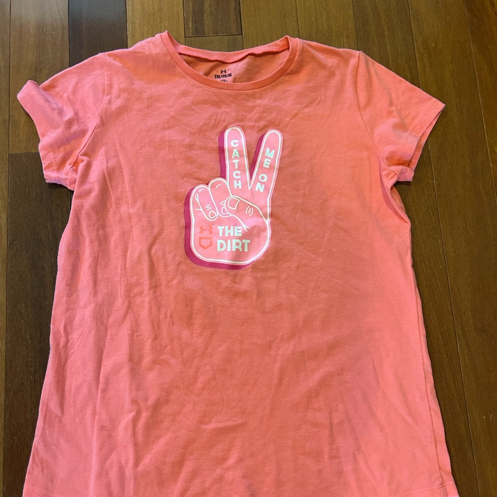 Under Armour girls' coral graphic t-shirt with a peace sign graphic